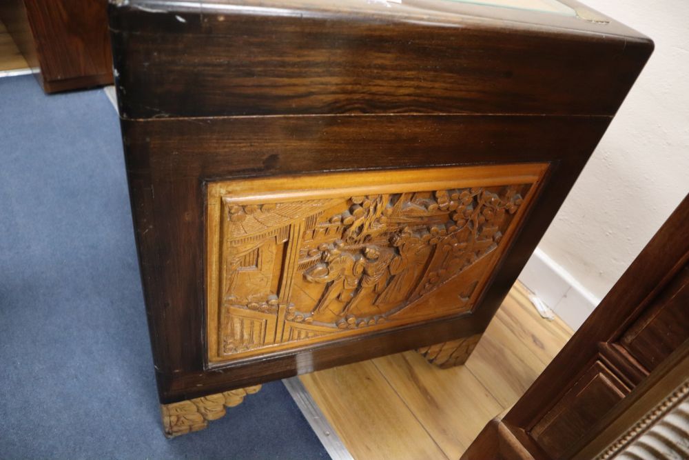 A Chinese carved camphor lined chest, width 110cm, depth 54cm, height 63cm